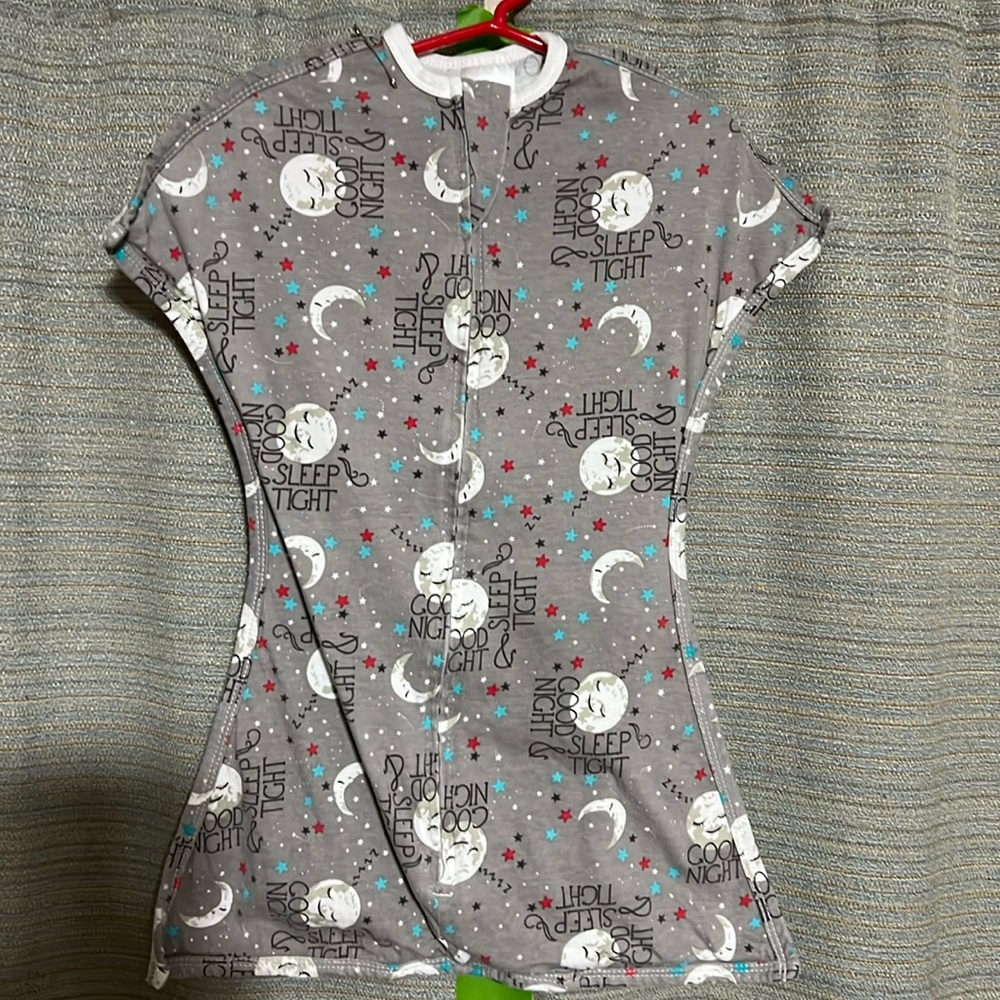 Sleeping baby zipadee-zip sleep sack.